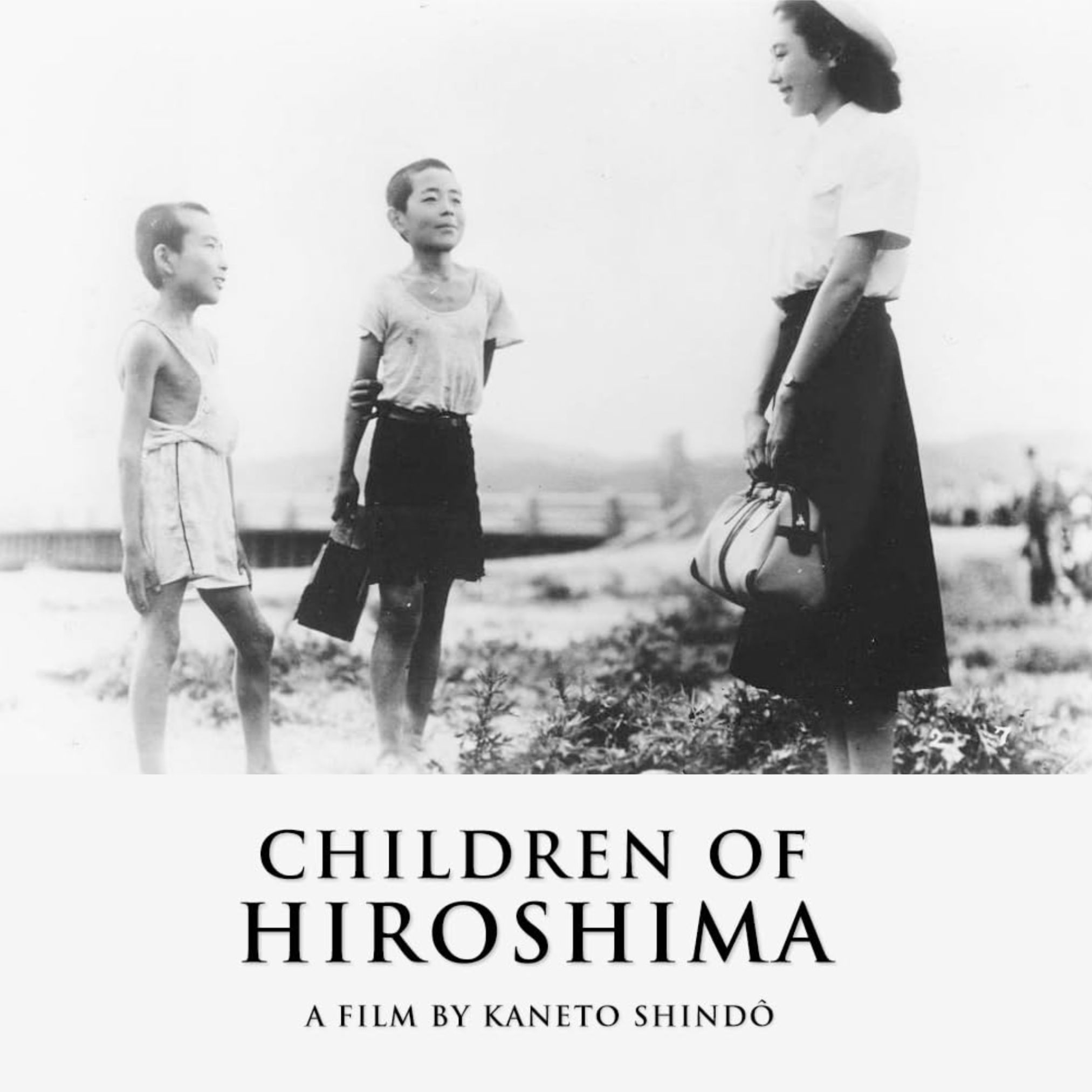 Title text and a black/white photograph of a Japanese woman talking with two young Japanese children
