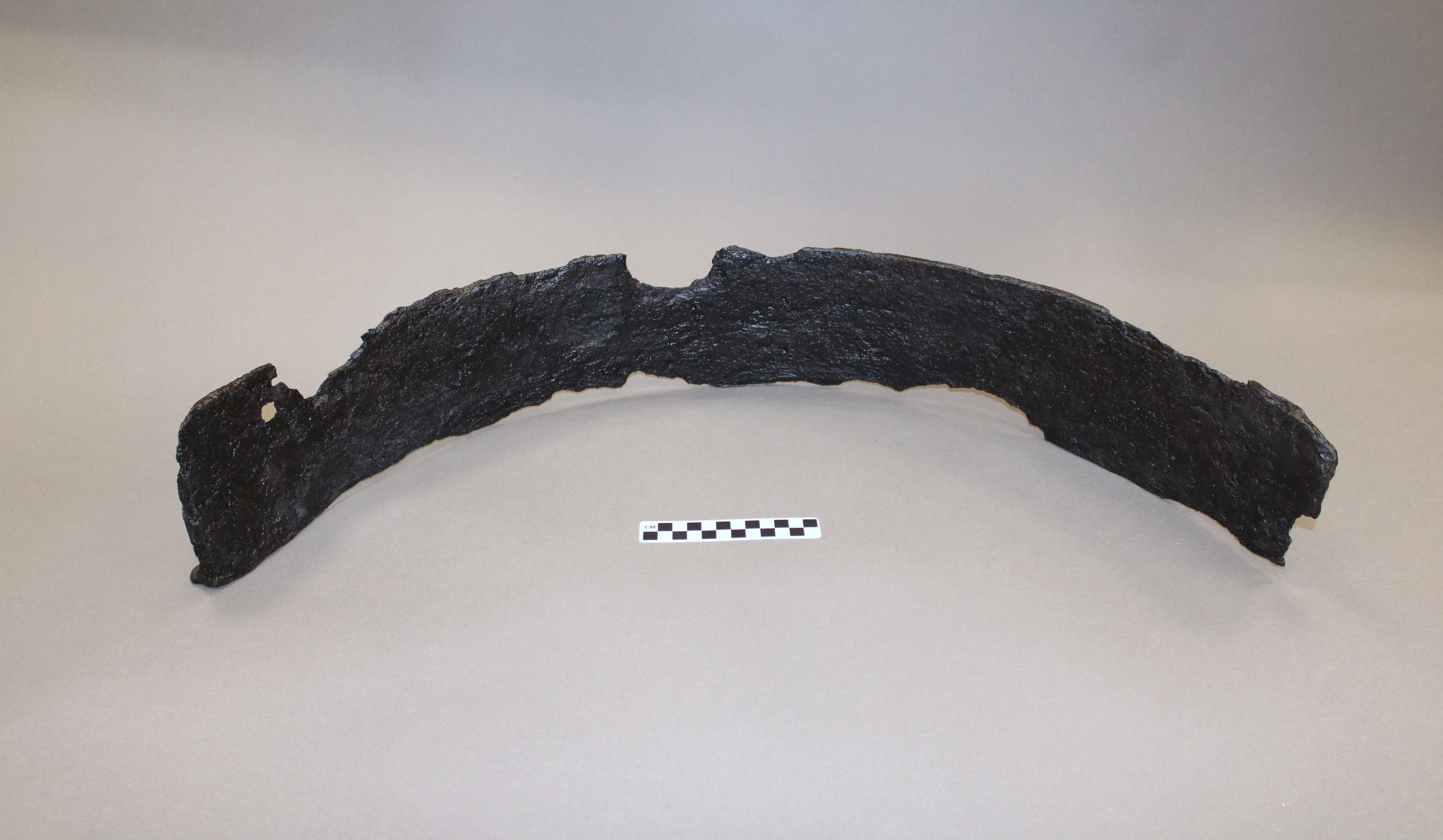 Original iron hearth ring after conservation treatment