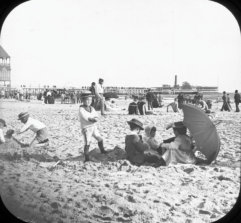 Vacationers enjoy a day on a Coney Island beach