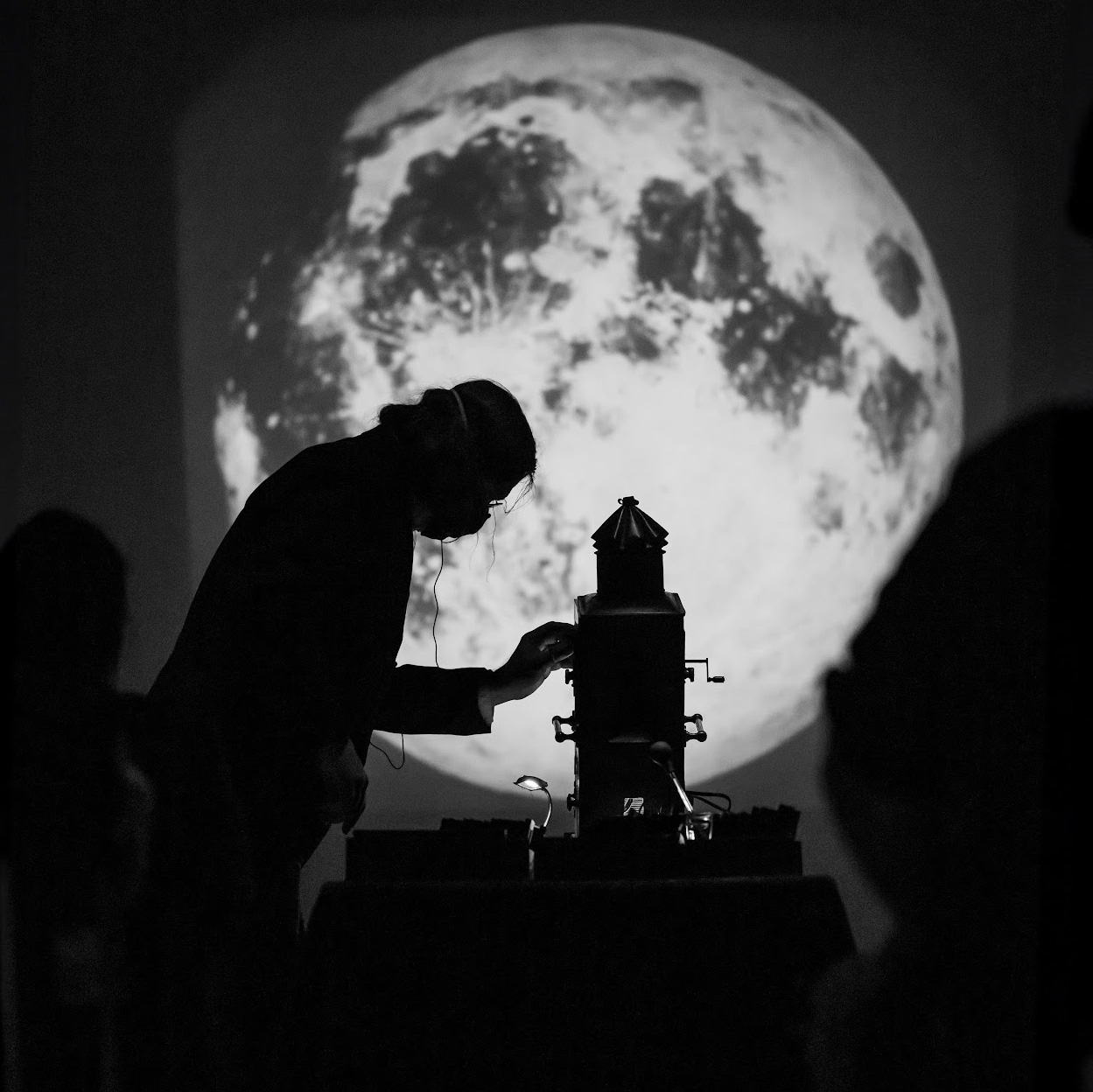 latern projection displaying a full moon