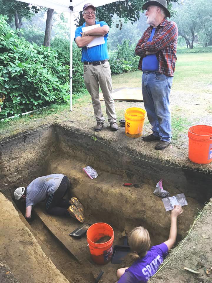 Dr. Michael Lucas, Curator of Historical Archaeology (left) and Marty Pickands, retired museum archaeologist (right) overlooking excavation by SUNY Albany field school students -- photo by Derek J. Healey