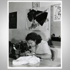 Photograph of woman sewing parachutes, United States Office of War Information, 1943