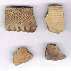pottery pieces uncovered in archaeological dig