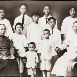Black/White family portrait of 11 individuals