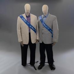 Two mannequins wearing men's suits with "Just Married" sashes