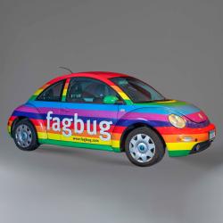 Volkswagen Beetle car wrapped in rainbow colors.