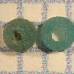 Two blue beads recovered from the outer kitchen excavation at Ten Broeck Mansion