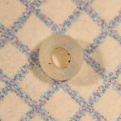 White bead found during excavation of Ten Broeck Mansion's outer kitchen