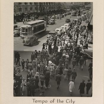 Historical photo of crowds on the streets of New York City. 