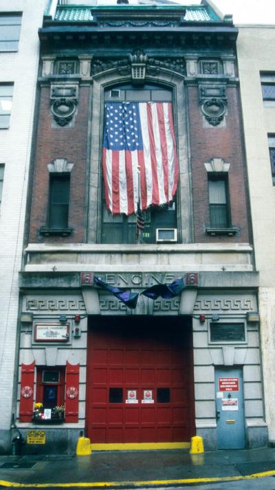 American flag hanging from building 