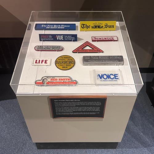View of a variety of newsstand paperweights
