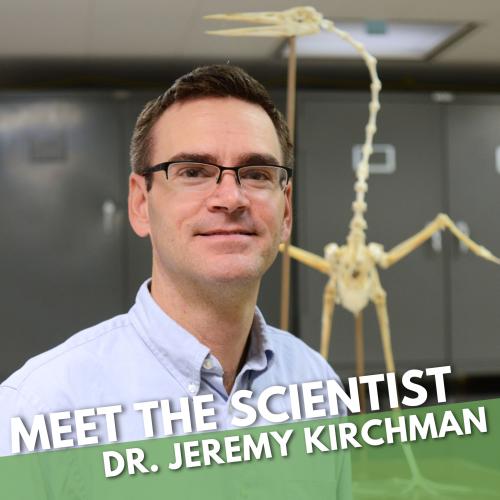 Photo of Jeremy Kirchman and a bird skeleton 
