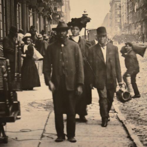 historical photo of a street scene in Harlem