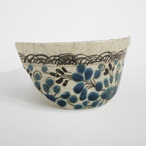 Piece of blue and white painted ceramic cup 