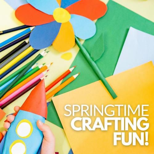 Colorful construction paper, pencils, and a paper flower craft