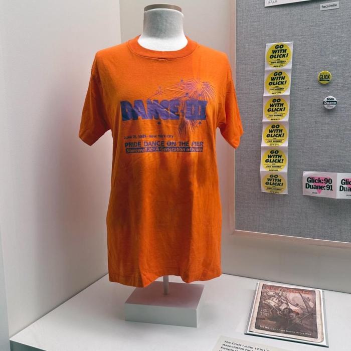 Orange Tshirt, political stickers and buttons