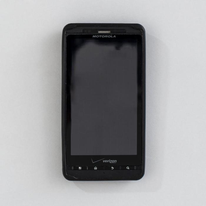 Weathered black mobile phone