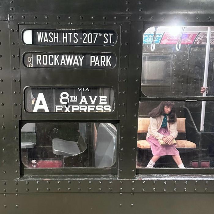 exterior of a commuter train with signage