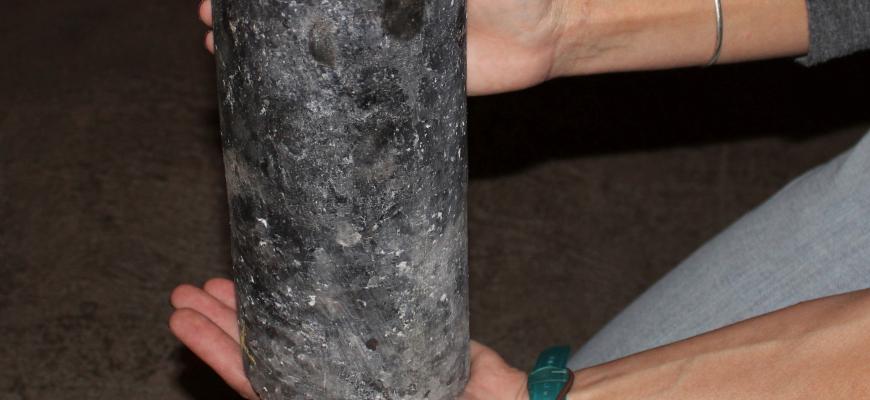someone holding a salt core sample