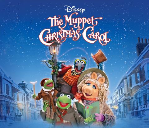 Title text The Muppet Christmas Carol with a group of muppets in a wintery street scene