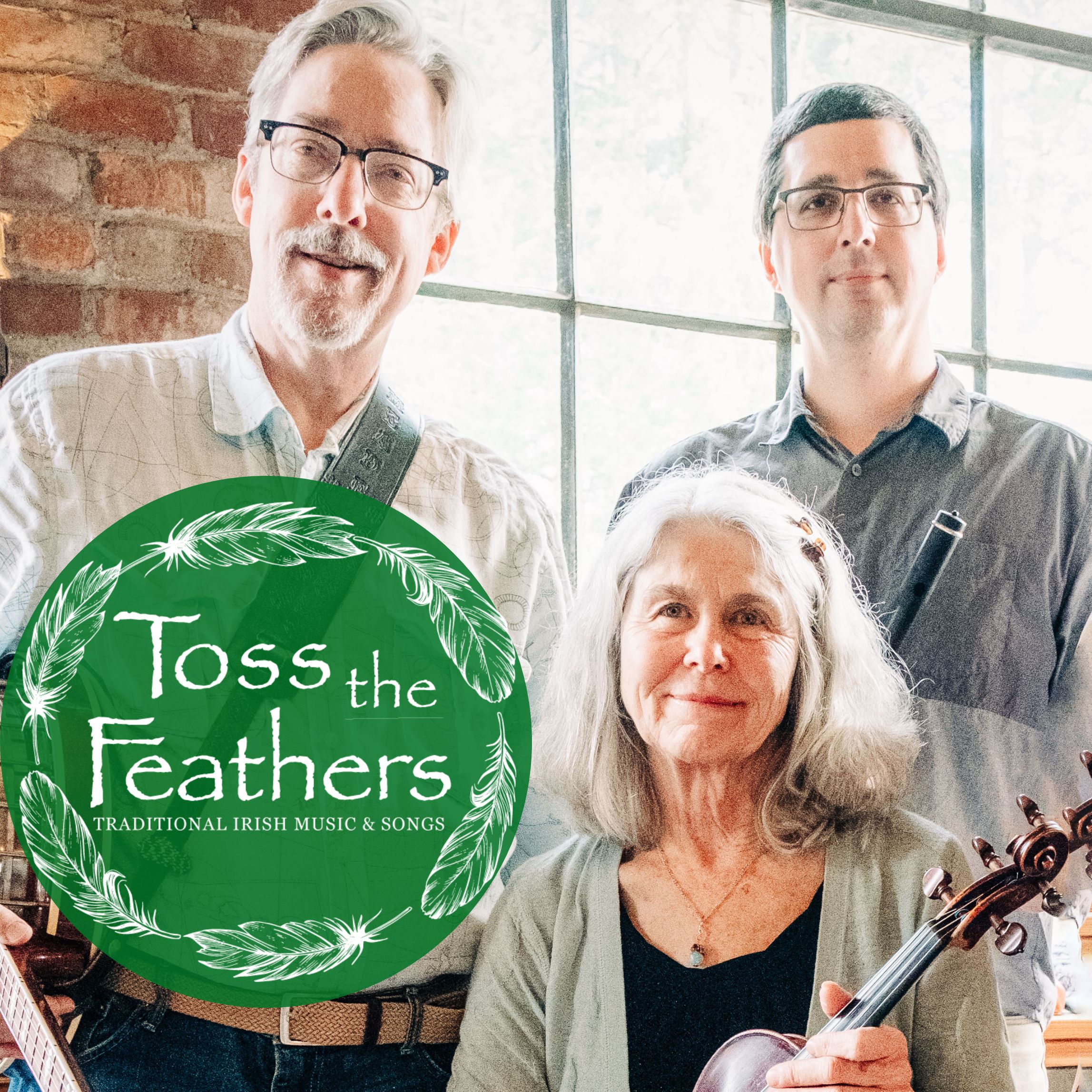 Photograph of two men and a woman from Toss the Feathers Band